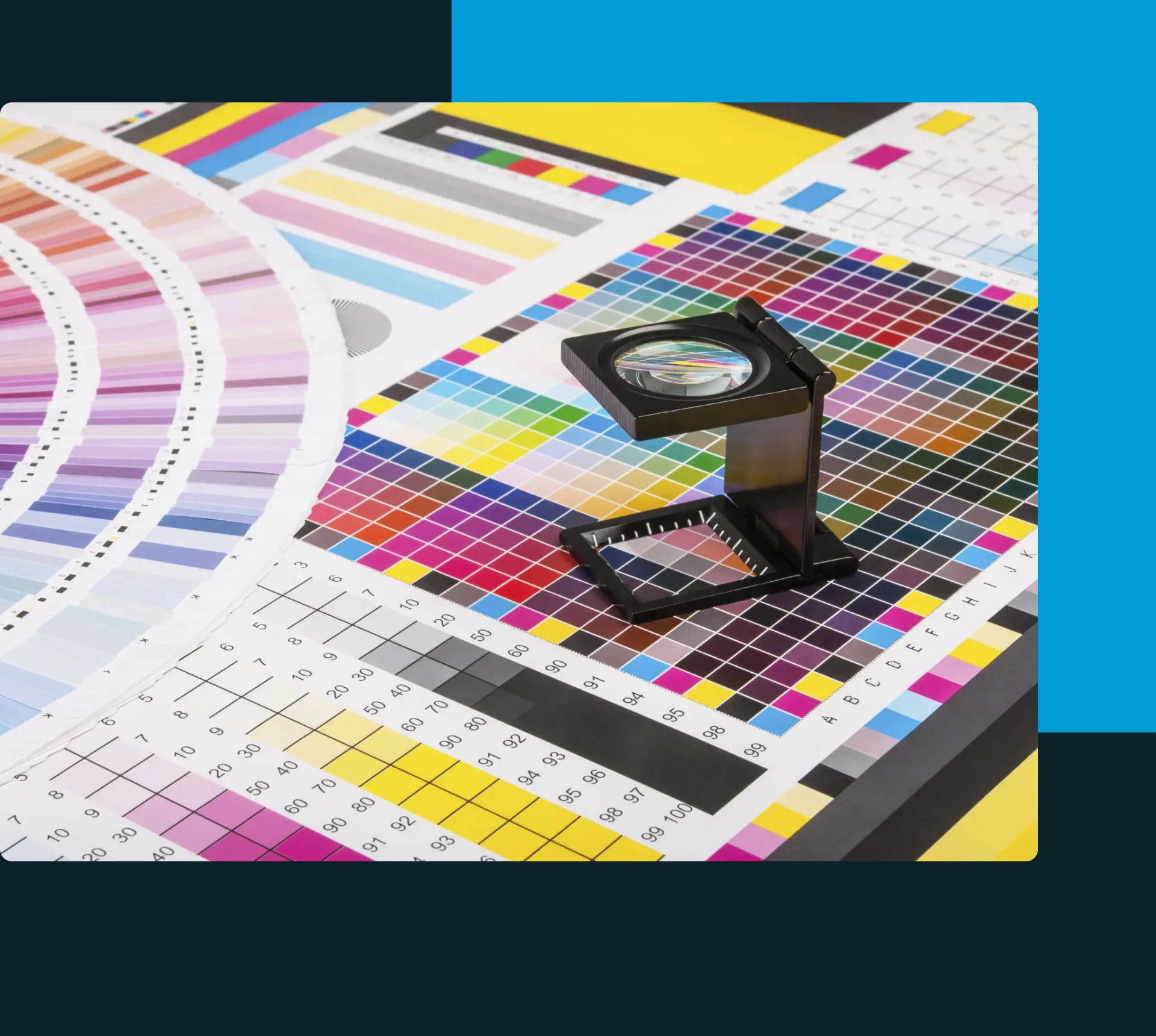 Color swatches and magnifying glass on paper.